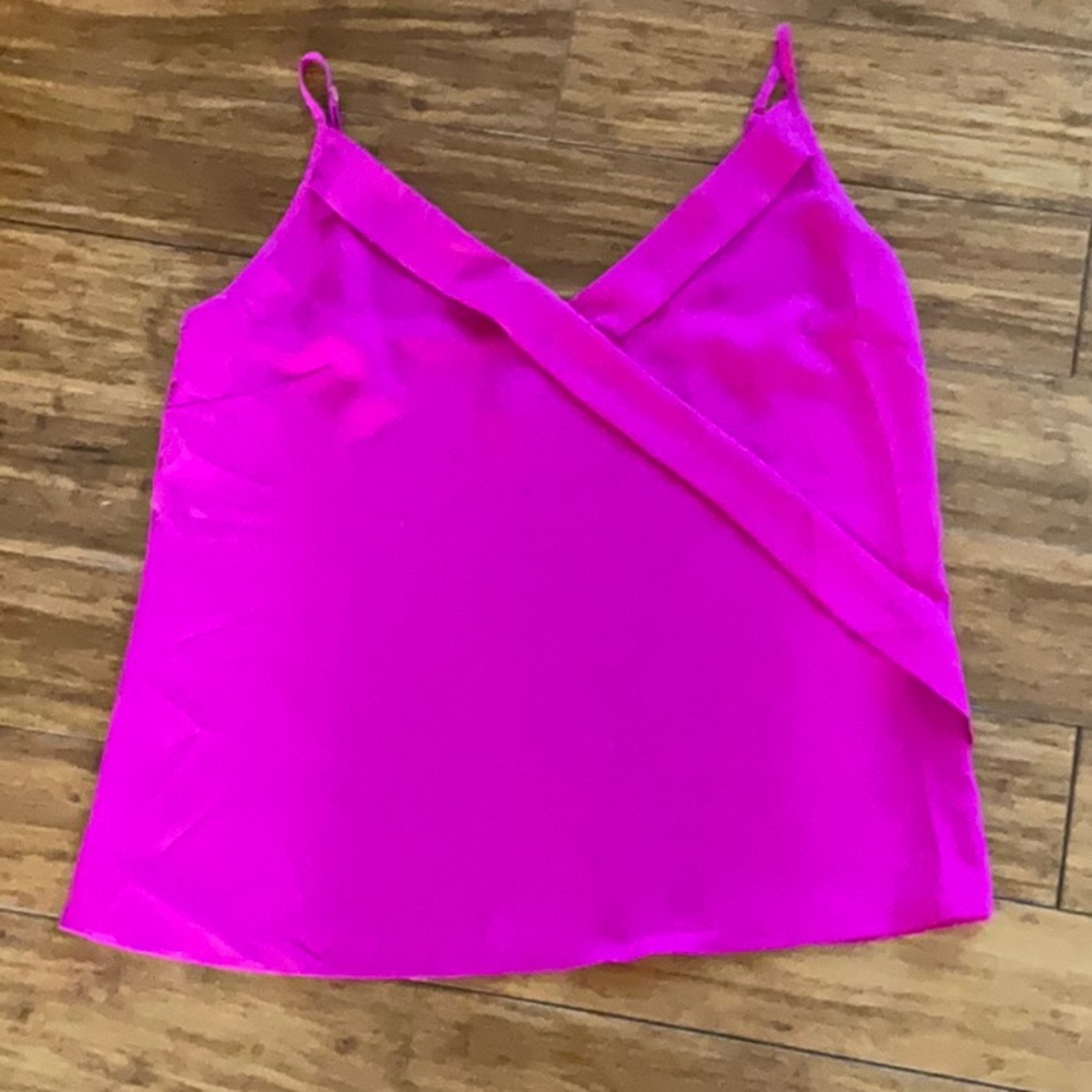 Hot pink camisole top with adjustable straps.